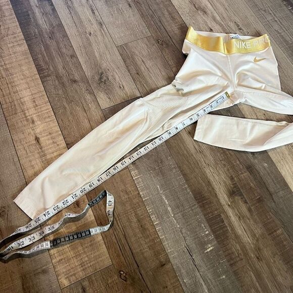 Nike Women's Pro Warm
7/8 Training Tights (Light
Cream/Gold small - Picture 8 of 11